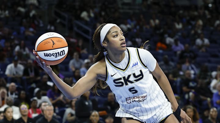 Aug 23, 2025; Chicago, Illinois, USA; Chicago Sky forward Angel Reese (5) looks to pass the ball against the Connecticut Sun during the second half at Wintrust Arena. Mandatory Credit: Kamil Krzaczynski-Imagn Images