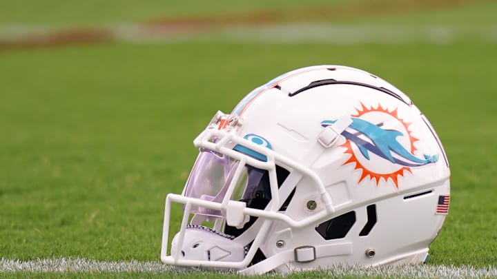 A general view of a Miami Dolphins helmet on the field during training camp at Baptist Health Training Complex.