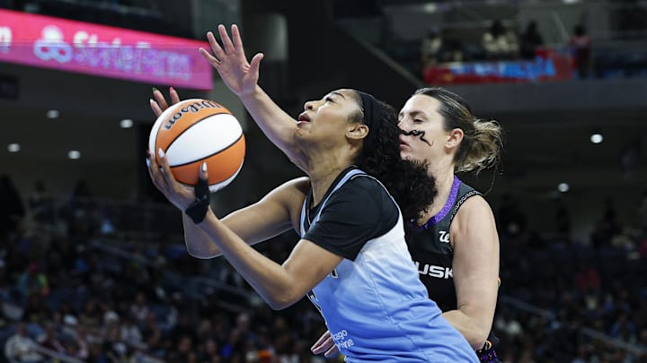 Chicago Sky forward Angel Reese drives to the basket against the Connecticut Sun.