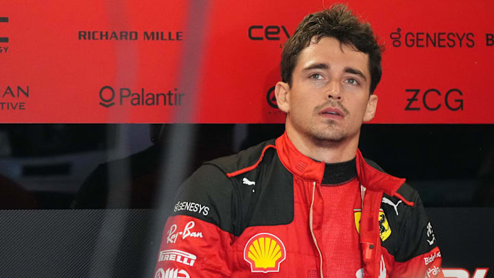 May 6, 2023; Miami Gardens, Florida, USA; Ferrari driver Charles Leclerc (16) of Monaco stands on the garage during practice for the Miami Grand Prix at Miami International Autodrome. Mandatory Credit: Jasen Vinlove-USA TODAY Sports