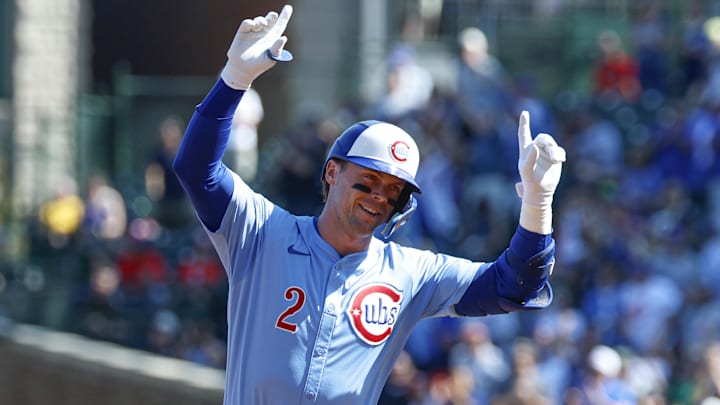 Chicago Cubs second baseman Nico Hoerner (2) rounds the bases after hitting a solo home run against the St. Louis Cardinals during the first inning at Wrigley Field. 