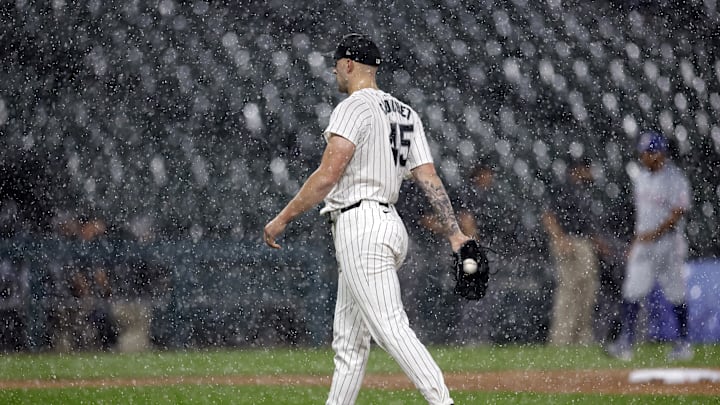 Chicago White Sox starting pitcher Garrett Crochet (45) walks off the field during heavy rain in the first inning of a baseball game between the Chicago White Sox and Texas Rangers at Guaranteed Rate Field on Aug 27. Chicago White Sox starting pitcher Garrett Crochet (45) walks off the field during heavy rain in the first inning of a baseball game between the Chicago White Sox and Texas Rangers at Guaranteed Rate Field on Aug 27.
