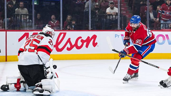 Apr 5, 2026; Montreal, Quebec, CAN; New Jersey Devils goalie Jacob Markstrom (25) makes a save against Montreal Canadiens center Joseph Veleno (90) during the first period at Bell Centre. Mandatory Credit: David Kirouac-Imagn Images