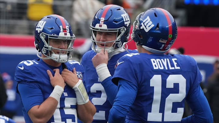 East Rutherford, NJ -- December 15, 2024 -- Giants quarterbacks Tommy DeVito, Drew Lock and Tim Boyle during pre game warm ups as the Baltimore Ravens came to MetLife Stadium to play the New York Giants.
