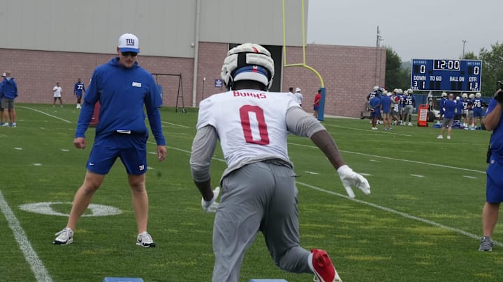 Outside linebacker coach Charlie Bullen with linebacker Brian Burns Outside linebacker coach Charlie Bullen with linebacker Brian Burns