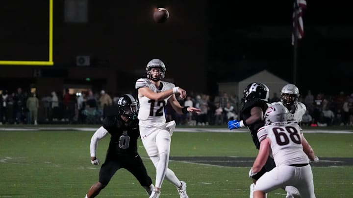 Collierville’s Grant Troutman (12) throws the ball during the game between Collierville High School and Houston High School in Germantown, Tenn., on Friday, November 1, 2024. Collierville’s Grant Troutman (12) throws the ball during the game between Collierville High School and Houston High School in Germantown, Tenn., on Friday, November 1, 2024.