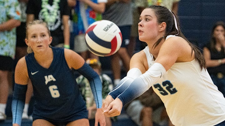 Jackson Academy's outside hitter Carson Caraway (32) bumps the ball during the MAIS division I championship game against MRA at the A.E. Wood Coliseum in Clinton, Miss., on Tuesday, Oct. 21, 2025.