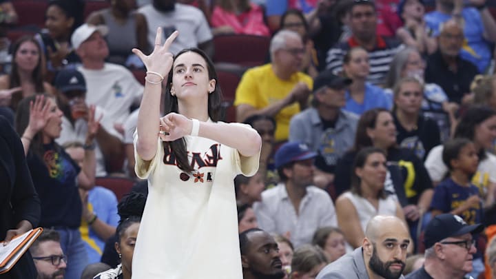 Jul 27, 2025; Chicago, Illinois, USA; Injured Indiana Fever guard Caitlin Clark (22) reacts during the first half of a basketball game against the Chicago Sky at United Center. Mandatory Credit: Kamil Krzaczynski-Imagn Images Jul 27, 2025; Chicago, Illinois, USA; Injured Indiana Fever guard Caitlin Clark (22) reacts during the first half of a basketball game against the Chicago Sky at United Center. Mandatory Credit: Kamil Krzaczynski-Imagn Images