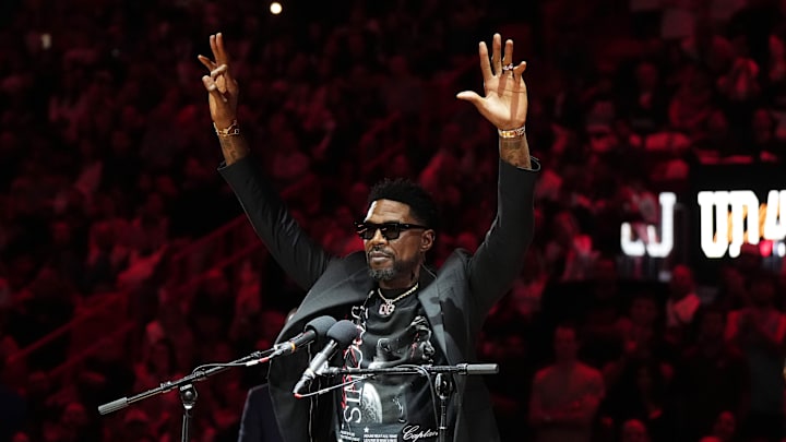 Jan 19, 2024; Miami, Florida, USA; Udonis Haslem speaks after his jersey was lifted to the rafters during the retirement ceremony during halftime of the game between the Miami Heat and the Atlanta Hawks Kaseya Center. Mandatory Credit: Jasen Vinlove-Imagn Images