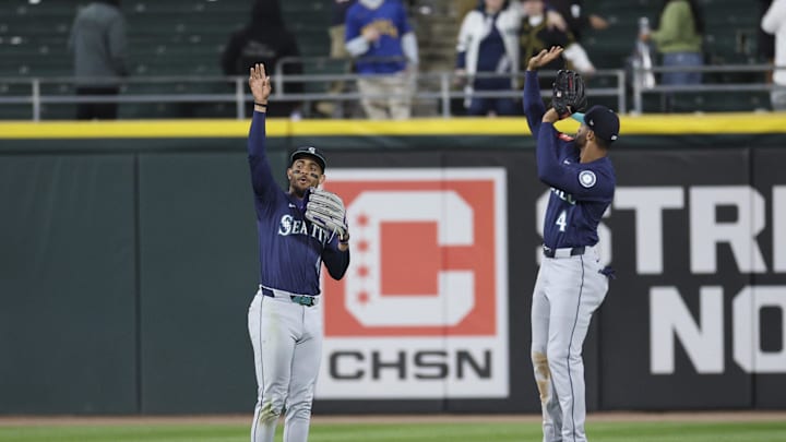 May 19, 2025; Chicago, Illinois, USA; Seattle Mariners center fielder Julio Rodriguez (44) and right fielder Leody Taveras (4) celebrate after the game against the Chicago White Sox at Rate Field on May 19. May 19, 2025; Chicago, Illinois, USA; Seattle Mariners center fielder Julio Rodriguez (44) and right fielder Leody Taveras (4) celebrate after the game against the Chicago White Sox at Rate Field on May 19.