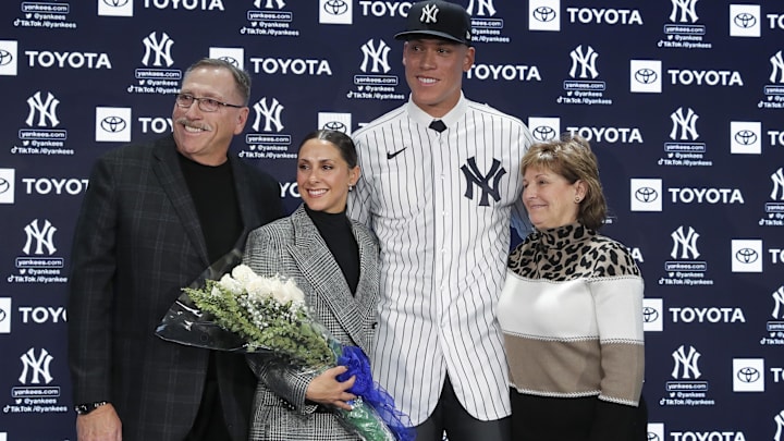 Dec 21, 2022; Bronx, New York, USA; Aaron Judge poses with Wayne Judge, Samantha Judge, and Patty Judge during a press conference at Yankee Stadium.