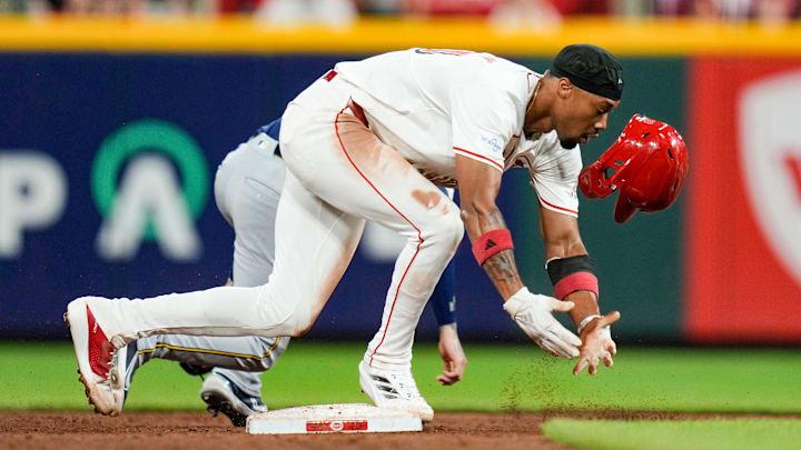 Cincinnati Reds outfielder Will Benson (30) looses his helmet as he slides safely to 2nd base in the 6th inning against the Milwaukee Brewers at Great American Ball Park, Saturday, August 31, 2024. Cincinnati Reds outfielder Will Benson (30) looses his helmet as he slides safely to 2nd base in the 6th inning against the Milwaukee Brewers at Great American Ball Park, Saturday, August 31, 2024.