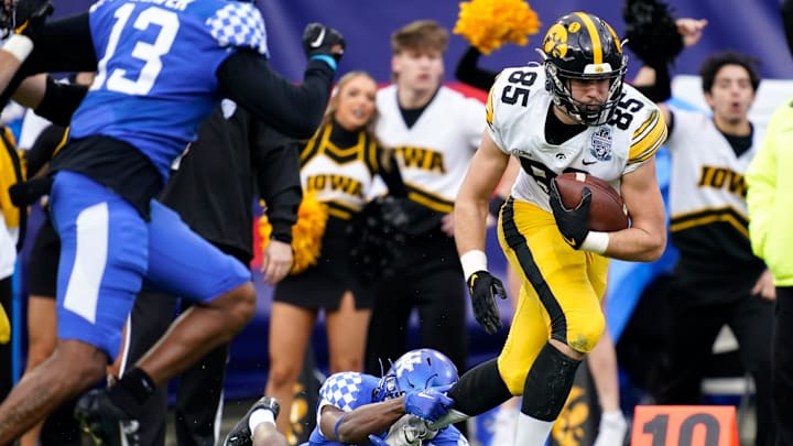 Iowa tight end Luke Lachey (85) slips past Kentucky defensive back Keidron Smith (1) for a touchdown during the second quarter of the TransPerfect Music City Bowl at Nissan Stadium in Nashville, Tenn., Saturday, Dec. 31, 2022.

Musiccitybowl 123122 An 024

Syndication The Tennessean
