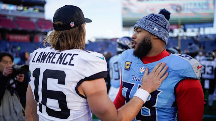 Jacksonville Jaguars quarterback Trevor Lawrence (16) and Tennessee Titans defensive tackle Jeffery Simmons (98) talk after the game at Nissan Stadium in Nashville, Tenn., Sunday, Nov. 30, 2025.