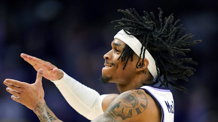 Dec 17, 2024; Kansas City, Missouri, USA; Kansas State Wildcats guard Dug McDaniel (0) celebrates during the second half against the Drake Bulldogs at T-Mobile Center. Mandatory Credit: Jay Biggerstaff-Imagn Images Dec 17, 2024; Kansas City, Missouri, USA; Kansas State Wildcats guard Dug McDaniel (0) celebrates during the second half against the Drake Bulldogs at T-Mobile Center. Mandatory Credit: Jay Biggerstaff-Imagn Images