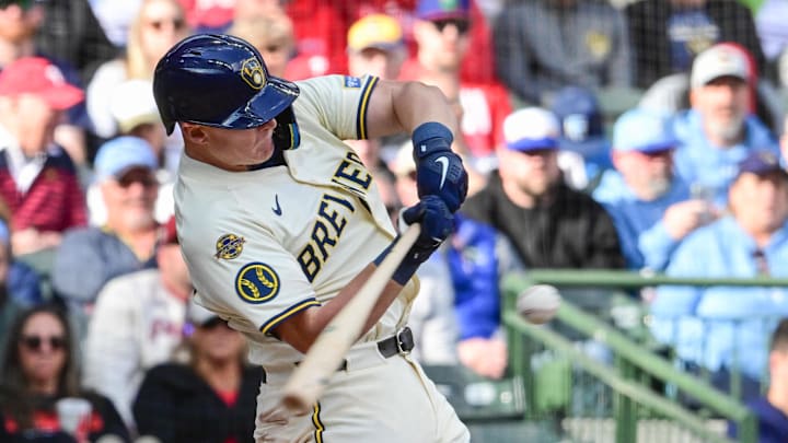 Sep 4, 2025; Milwaukee, Wisconsin, USA;  Milwaukee Brewers first baseman Andrew Vaughn (28) hits a double against the Philadelphia Phillies in the seventh inning at American Family Field. Mandatory Credit: Benny Sieu-Imagn Images