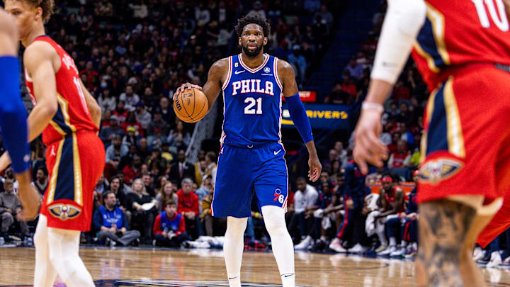 Dec 30, 2022; New Orleans, Louisiana, USA; Philadelphia 76ers center Joel Embiid (21) looks to pass the ball against the New Orleans Pelicans during the first half at Smoothie King Center. Mandatory Credit: Stephen Lew-Imagn Images