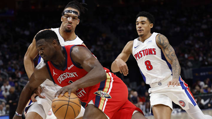Mar 24, 2024; Detroit, Michigan, USA; New Orleans Pelicans forward Zion Williamson (1) dribbles on Detroit Pistons forward Tosan Evbuomwan (18) in the first half at Little Caesars Arena. Mandatory Credit: Rick Osentoski-Imagn Images Mar 24, 2024; Detroit, Michigan, USA; New Orleans Pelicans forward Zion Williamson (1) dribbles on Detroit Pistons forward Tosan Evbuomwan (18) in the first half at Little Caesars Arena. Mandatory Credit: Rick Osentoski-Imagn Images