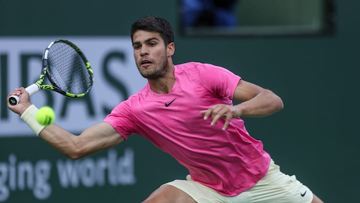 Carlos Alcarez reaches for a shot against Jannik Sinner in the semifinal match at the BNP Paribas Open at the Indian Wells Tennis Garden in Indian Wells, Calif., March 18, 2023.

Bnp Saturday 31