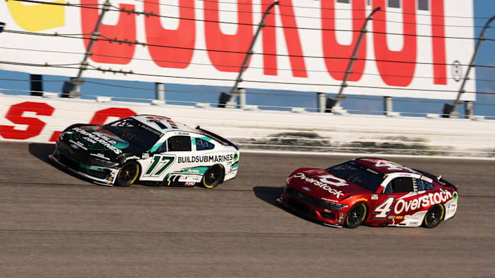 Sep 1, 2024; Darlington, South Carolina, USA; NASCAR Cup Series driver Chris Buescher (17) races ahead of NASCAR Cup Series driver Josh Berry (4) during the Cook Out Southern 500 at Darlington Raceway. Mandatory Credit: Jasen Vinlove-Imagn Images