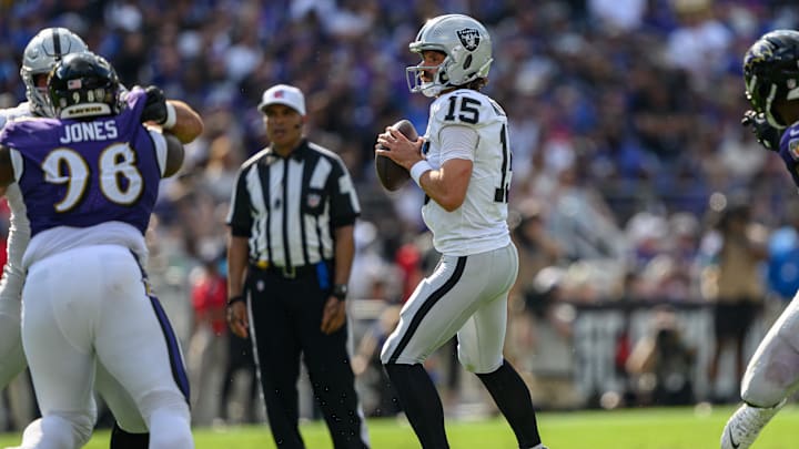 Sep 15, 2024; Baltimore, Maryland, USA; Las Vegas Raiders quarterback Gardner Minshew (15) stands in the pocket during the second half against the Baltimore Ravens at M&T Bank Stadium. Mandatory Credit: Reggie Hildred-Imagn Images
