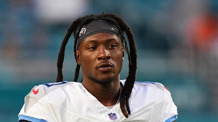 Sep 30, 2024; Miami Gardens, Florida, USA; Tennessee Titans wide receiver DeAndre Hopkins (10) warms up prior to the game against the Miami Dolphins at Hard Rock Stadium. Mandatory Credit: Jasen Vinlove-Imagn Images