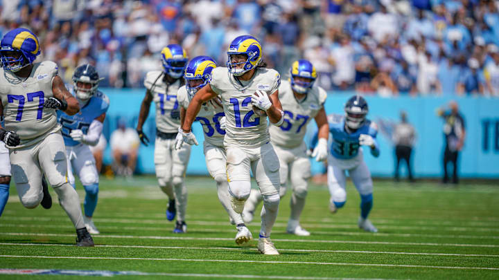 Los Angeles Rams wide receiver Puka Nacua (12) runs in a touchdown against the Tennessee Titans during the first quarter at Nissan Stadium in Nashville, Tenn., Sunday, Sept. 14, 2025.