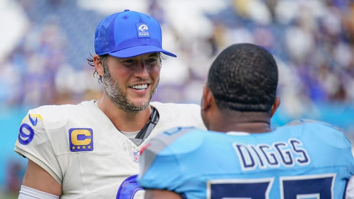 Los Angeles Rams quarterback Matthew Stafford (9) and Tennessee Titans safety Quandre Diggs (28) talk after the Titans’ 33-19 loss to the Rams at Nissan Stadium in Nashville, Tenn., Sunday, Sept. 14, 2025.