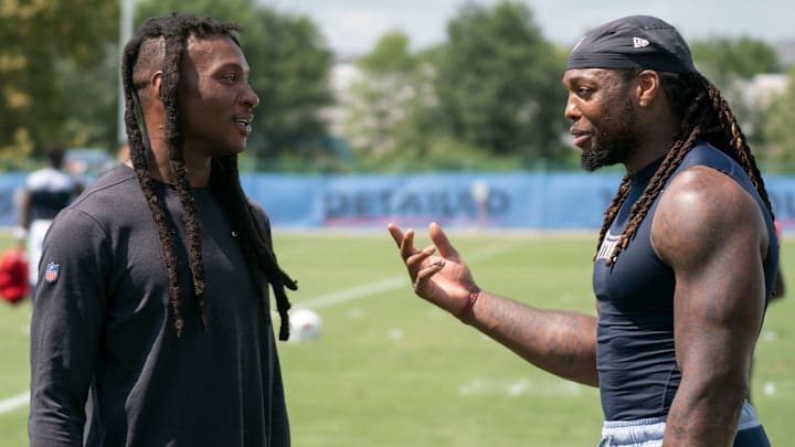 Arizona Cardinals wide receiver DeAndre Hopkins talks with Tennessee Titans running back Derrick Henry after a joint training camp practice at Ascension Saint Thomas Sports Park Wednesday, Aug. 24, 2022, in Nashville, Tenn.

Nas Titans Cardinals 022