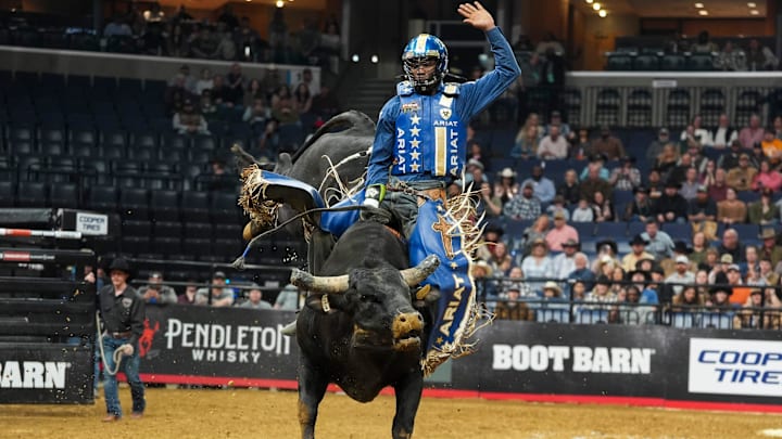 Rider Ezekiel Mitchell rides bull Misery Company during the PBR Pendleton Whisky Velocity Tour’s PBR Memphis event at FedExForum on Saturday, February 15, 2025.