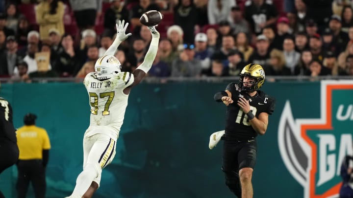 Dec 22, 2023; Tampa, FL, USA; Georgia Tech Yellow Jackets defensive lineman Eddie Kelly (97) tips
