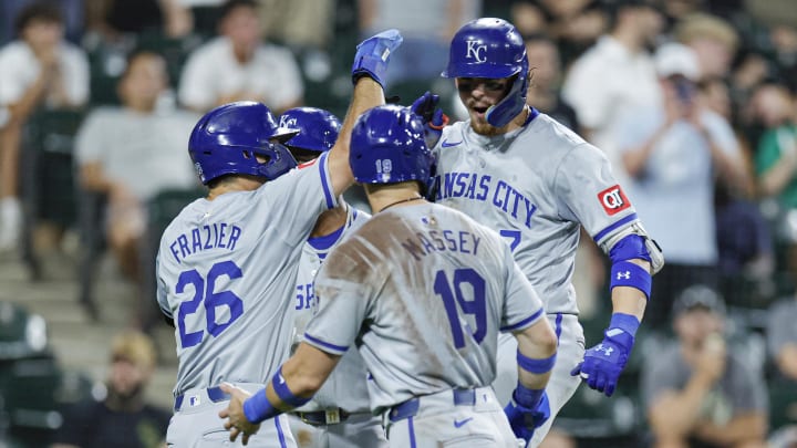 Jul 28, 2024; Chicago, Illinois, USA; Kansas City Royals shortstop Bobby Witt Jr. (7) celebrates with teammates after hitting a grand slam against the Chicago White Sox during the eight inning at Guaranteed Rate Field. Mandatory Credit: Kamil Krzaczynski-USA TODAY Sports
