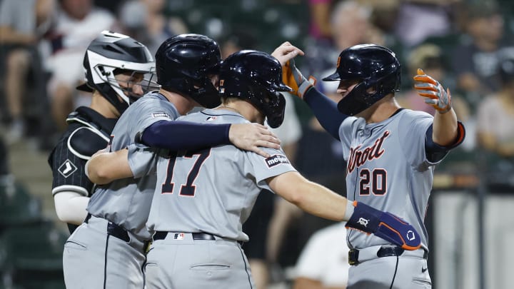 Aug 26, 2024; Chicago, Illinois, USA; Detroit Tigers first baseman Spencer Torkelson (20) celebrates with second baseman Jace Jung (17) and second baseman Colt Keith (33) after hitting a three-run home run against the Chicago White Sox during the seventh inning at Guaranteed Rate Field.