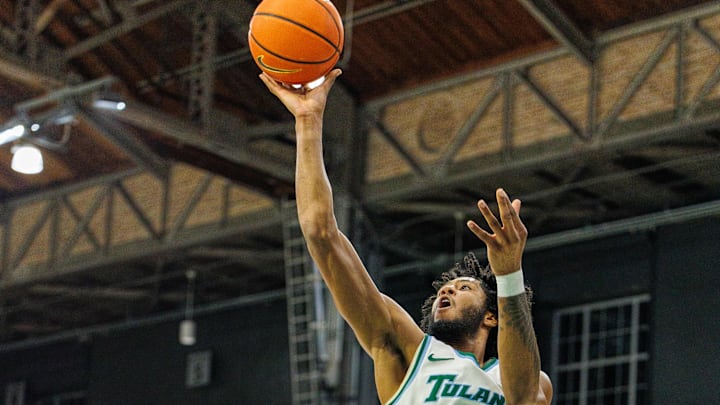 Jan 30, 2025; New Orleans, Louisiana, USA; Tulane Green Wave guard Mari Jordan (5) shoots a jump shot against Memphis Tigers guard Tyrese Hunter (11) during the second half at Avron B. Fogelman Arena in Devlin Fieldhouse.