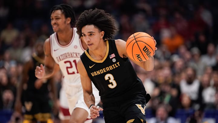 Vanderbilt guard Tyler Tanner (3) brings the ball up the court during the first half of the SEC tournament championship game against Arkansas at Bridgestone Arena in Nashville, Tenn., Sunday, March 15, 2026.
