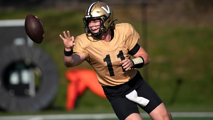 Vanderbilt quarterback Jack Elliott (11) goes through drills at Vanderbilt University’s McGugin Center practice fields Tuesday, April 7, 2026. Vanderbilt quarterback Jack Elliott (11) goes through drills at Vanderbilt University’s McGugin Center practice fields Tuesday, April 7, 2026.