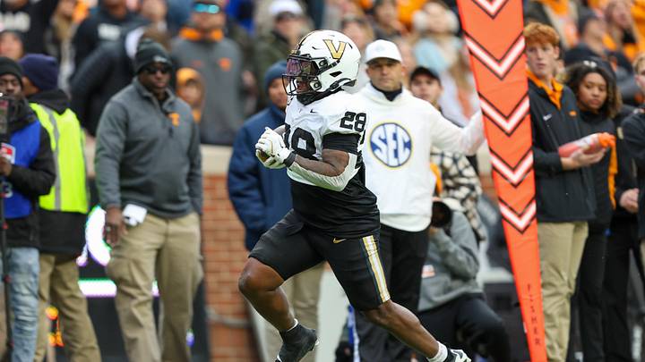 Nov 29, 2025; Knoxville, Tennessee, USA; Vanderbilt Commodores running back Sedrick Alexander (28) runs for a touchdown against the Tennessee Volunteers during the first half against at Neyland Stadium. Mandatory Credit: Randy Sartin-Imagn Images Nov 29, 2025; Knoxville, Tennessee, USA; Vanderbilt Commodores running back Sedrick Alexander (28) runs for a touchdown against the Tennessee Volunteers during the first half against at Neyland Stadium. Mandatory Credit: Randy Sartin-Imagn Images