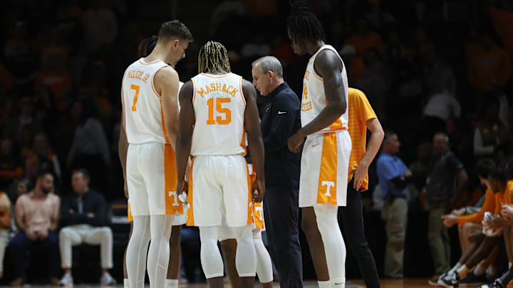 Dec 31, 2024; Knoxville, Tennessee, USA; Tennessee Volunteers head coach Rick Barnes speaks with his team during the first half against the Norfolk State Spartans at Thompson-Boling Arena at Food City Center. Mandatory Credit: Randy Sartin-Imagn Images