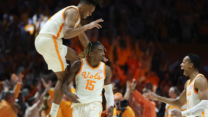 Mar 1, 2025; Knoxville, Tennessee, USA; Tennessee Volunteers guard Chaz Lanier (2) and guard Jordan Gainey (11) celebrate with guard Jahmai Mashack (15) Mashack after hitting a game winning three pointer against the Alabama Crimson Tide at Thompson-Boling Arena at Food City Center. Mandatory Credit: Randy Sartin-Imagn Images