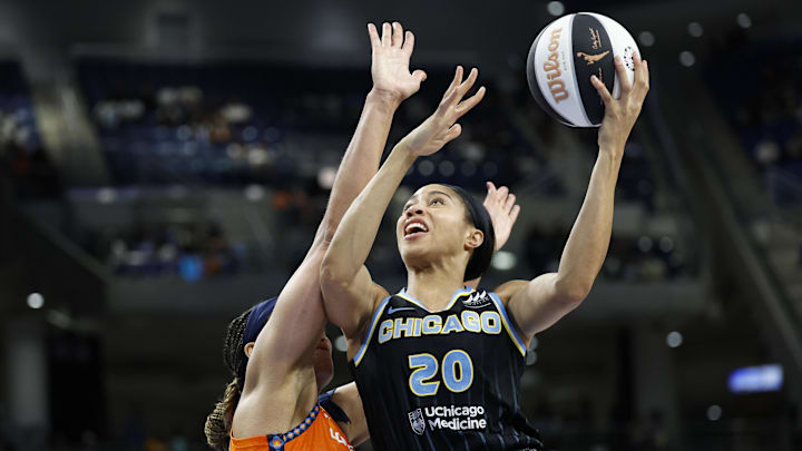 Jun 12, 2024; Chicago, Illinois, USA; Chicago Sky forward Isabelle Harrison (20) goes to the basket against the Connecticut Sun during the second half of a basketball game at Wintrust Arena. Mandatory Credit: Kamil Krzaczynski-Imagn Images