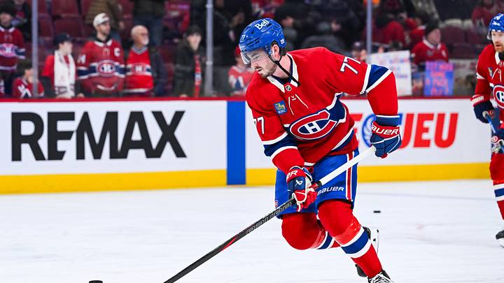 Montreal Canadiens center Kirby Dach (77) skates with a puck during warm-up before the game against the New York Islanders at Bell Centre. Mandatory Credit: David Kirouac-Imagn Images