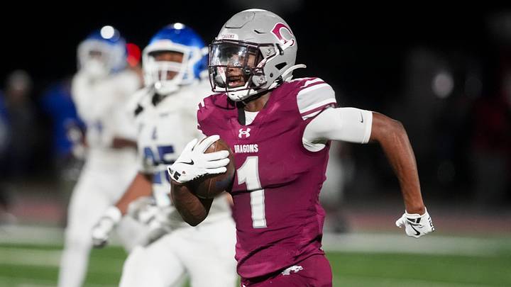 Collierville's Tae Walden Jr (1) returns a kickoff for a touchdown during the second round Class 6A playoff game between Antioch High School and Collierville High School in Collierville, Tenn., on November 14, 2025.
