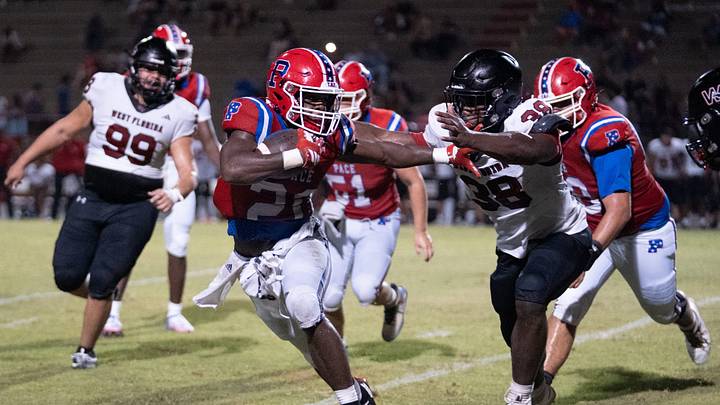 Pace High running back Makael Williams (20) carries the ball against West Florida during a preseason game on Aug. 13, 2026. He rushed 19 times for 228 yards and four touchdowns in a 41-0 season-opening rout of Fairhope (AL) last week. Pace High running back Makael Williams (20) carries the ball against West Florida during a preseason game on Aug. 13, 2026. He rushed 19 times for 228 yards and four touchdowns in a 41-0 season-opening rout of Fairhope (AL) last week.