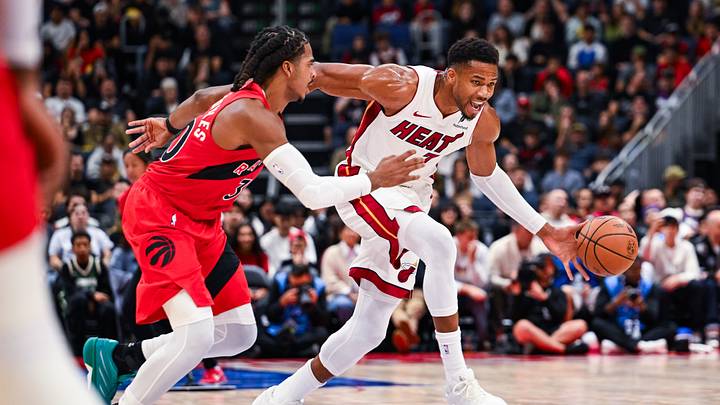 Oct 3, 2026; Quebec City, Quebec, CAN; Miami Heat forward Giannis Antetokounmpo (7) dribbles the ball against Toronto Raptors forward Collin Murray-Boyles (30) during the first quarter at Videotron Centre. Mandatory Credit: David Kirouac-Imagn Images