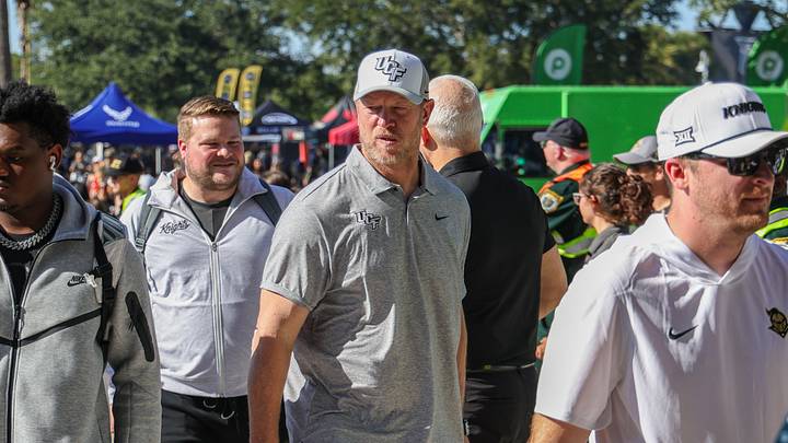 Nov 22, 2025; Orlando, Florida, USA; UCF Knights head coach Scott Frost walks into the venue before the game against the Oklahoma State Cowboys at Acrisure Bounce House. Mandatory Credit: Mike Watters-Imagn Images Nov 22, 2025; Orlando, Florida, USA; UCF Knights head coach Scott Frost walks into the venue before the game against the Oklahoma State Cowboys at Acrisure Bounce House. Mandatory Credit: Mike Watters-Imagn Images