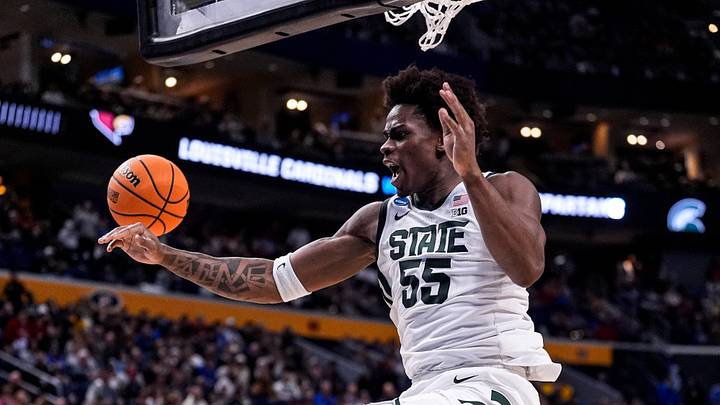 Michigan State forward Coen Carr (55) dunks against Louisville during the second half of NCAA Tournament Second Round at KeyBank Center in Buffalo on Saturday, March 21, 2026. Michigan State forward Coen Carr (55) dunks against Louisville during the second half of NCAA Tournament Second Round at KeyBank Center in Buffalo on Saturday, March 21, 2026.