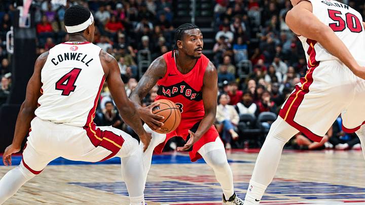 Oct 3, 2026; Quebec City, Quebec, CAN; Toronto Raptors guard Jaden Bradley (8) dribbles the ball against Miami Heat guard Ryan Conwell (4) during the fourth quarter at Videotron Centre. Oct 3, 2026; Quebec City, Quebec, CAN; Toronto Raptors guard Jaden Bradley (8) dribbles the ball against Miami Heat guard Ryan Conwell (4) during the fourth quarter at Videotron Centre.