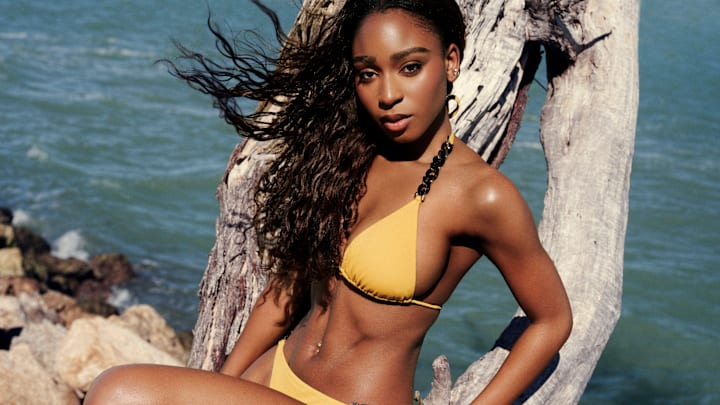Normani was photographed by Katherine Goguen on Captiva Island, Fla. Swimsuit by OYE Swimwear.