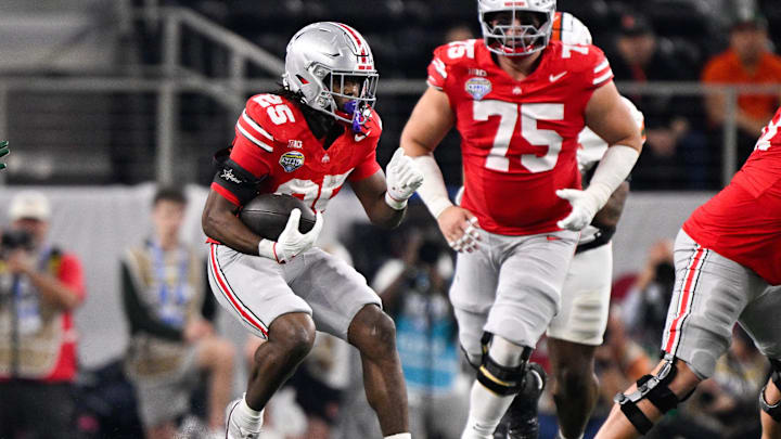 Dec 31, 2025; Arlington, TX, USA; Ohio State Buckeyes running back Bo Jackson (25) runs the ball in the first quarter against the Miami Hurricanes during the 2025 Cotton Bowl and quarterfinal game of the College Football Playoff at AT&T Stadium. Mandatory Credit: Jerome Miron-Imagn Images Dec 31, 2025; Arlington, TX, USA; Ohio State Buckeyes running back Bo Jackson (25) runs the ball in the first quarter against the Miami Hurricanes during the 2025 Cotton Bowl and quarterfinal game of the College Football Playoff at AT&T Stadium. Mandatory Credit: Jerome Miron-Imagn Images