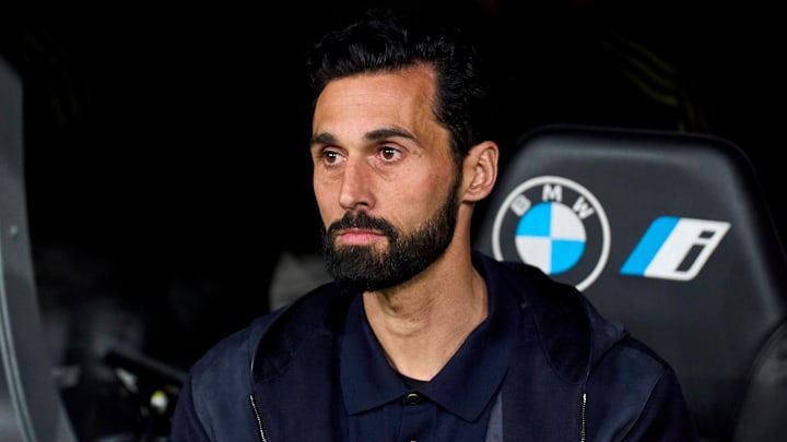 Alvaro Arbeloa looks on